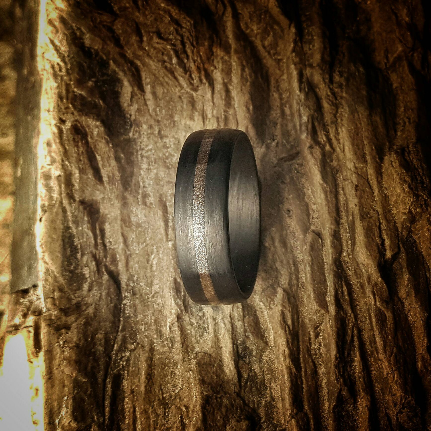 Bronze Age, 7mm wide, Carbon Fiber Ring.